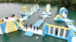 Aerial view of people enjoying the inflatables at Fenland Aquapark