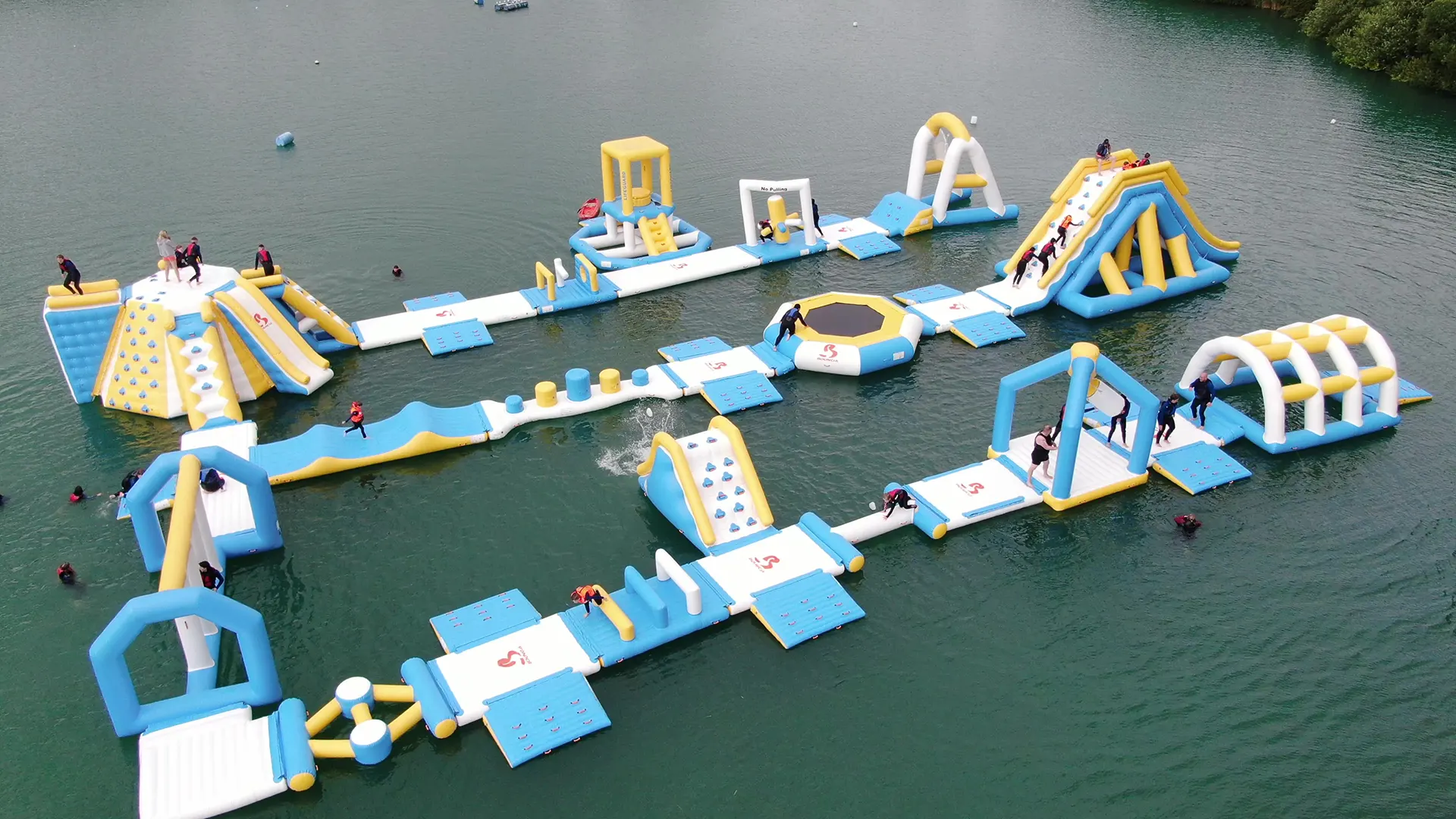 Aerial view of people enjoying the inflatables at Fenland Aquapark
